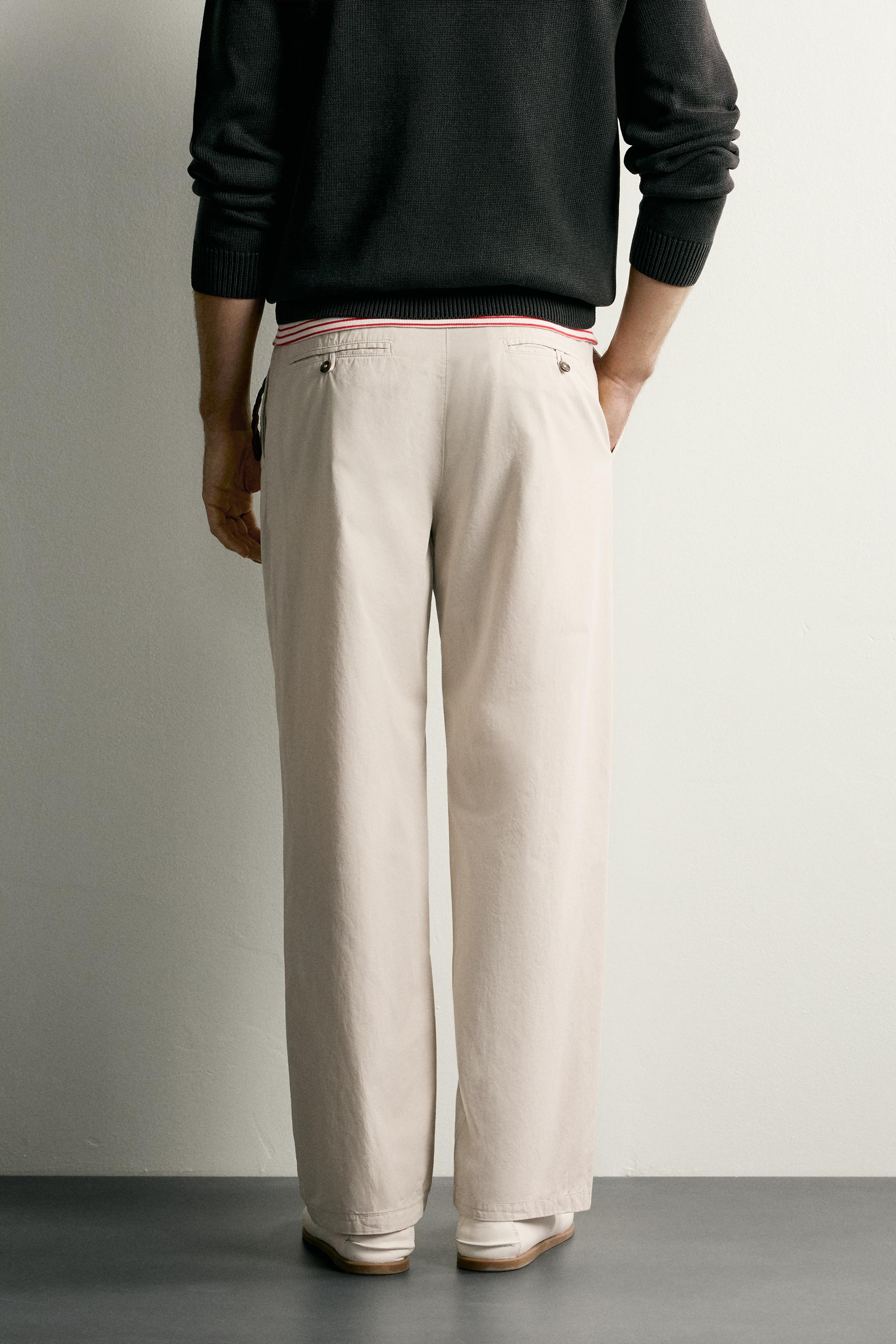 PLEATED STRAIGHT FIT CHINO PANTS